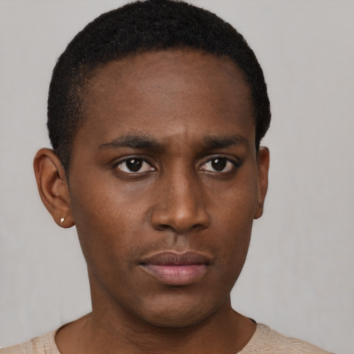 Neutral black young-adult male with short  brown hair and brown eyes