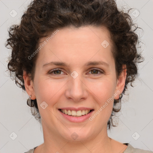 Joyful white young-adult female with medium  brown hair and green eyes