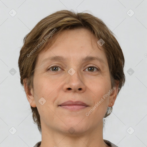 Joyful white adult female with short  brown hair and brown eyes