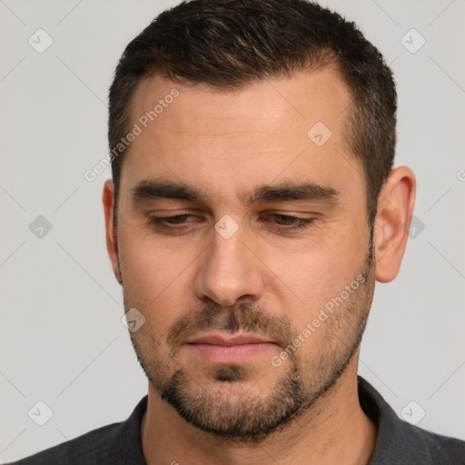 Neutral white young-adult male with short  brown hair and brown eyes