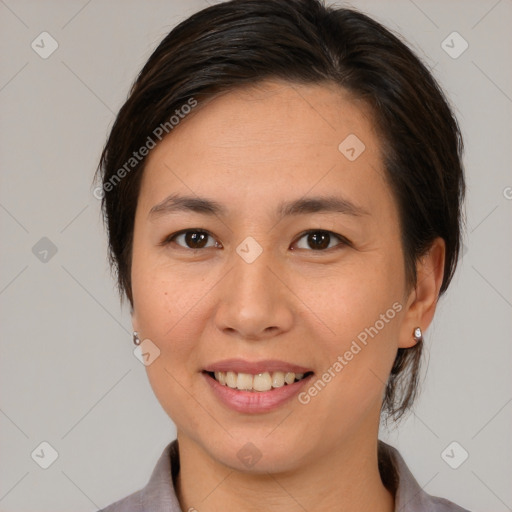 Joyful white young-adult female with medium  brown hair and brown eyes