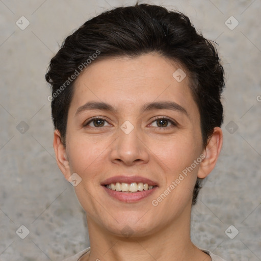 Joyful white young-adult female with short  brown hair and brown eyes