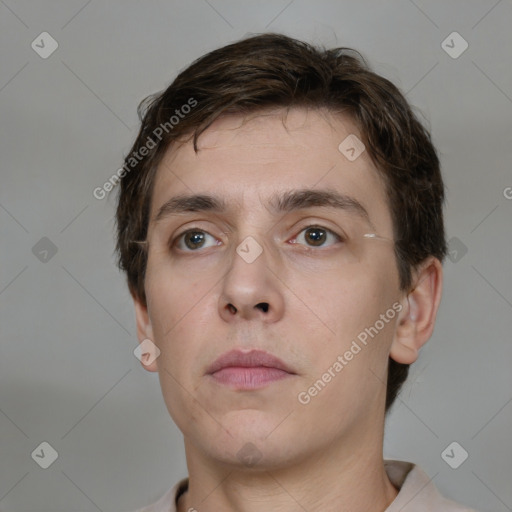 Neutral white young-adult male with short  brown hair and brown eyes