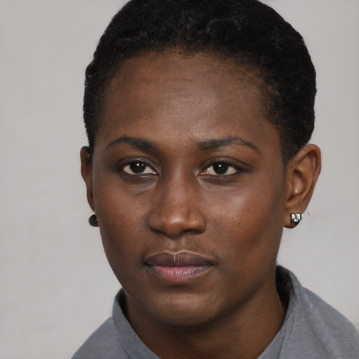 Neutral black young-adult female with short  black hair and brown eyes