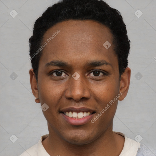 Joyful black young-adult male with short  black hair and brown eyes