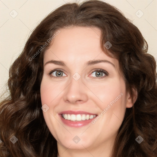 Joyful white young-adult female with long  brown hair and green eyes