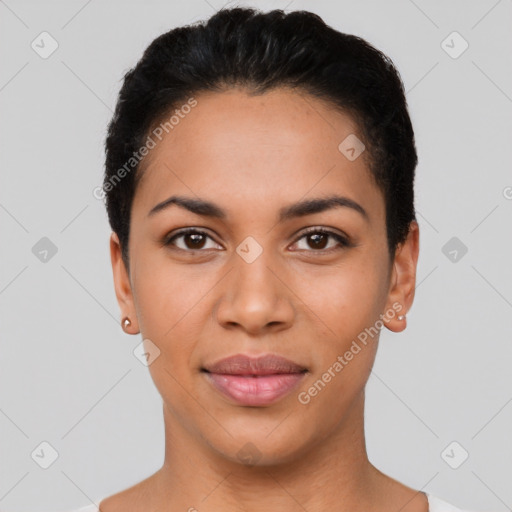 Joyful latino young-adult female with short  black hair and brown eyes