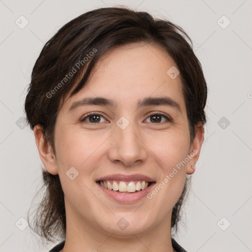 Joyful white young-adult female with medium  brown hair and brown eyes