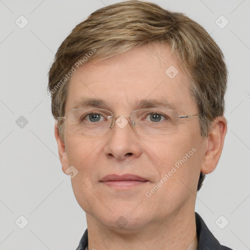 Joyful white adult male with short  brown hair and grey eyes