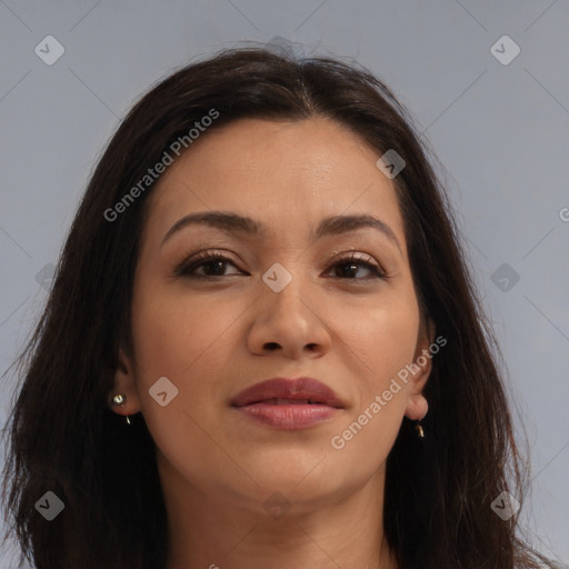 Joyful latino young-adult female with long  brown hair and brown eyes