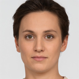 Neutral white young-adult female with short  brown hair and brown eyes