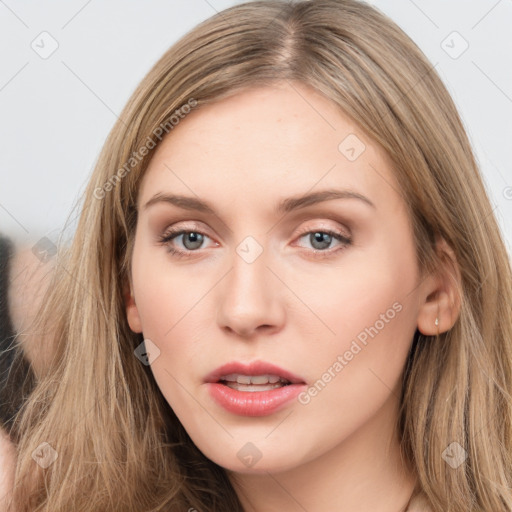 Neutral white young-adult female with long  brown hair and grey eyes