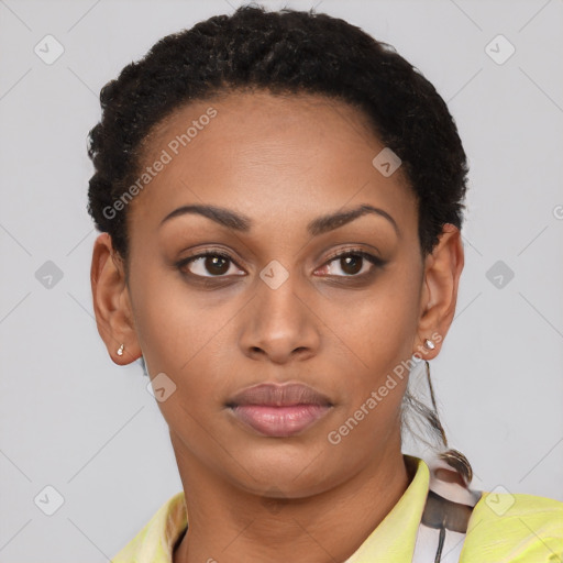 Joyful latino young-adult female with short  brown hair and brown eyes