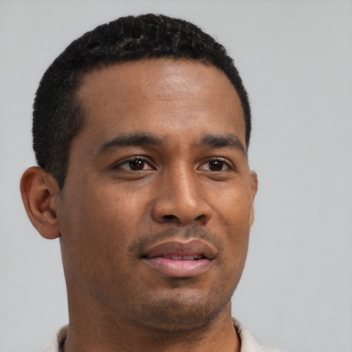 Neutral latino young-adult male with short  brown hair and brown eyes