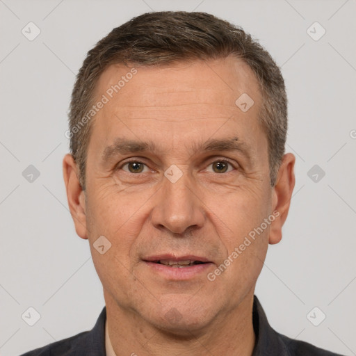 Joyful white adult male with short  brown hair and brown eyes