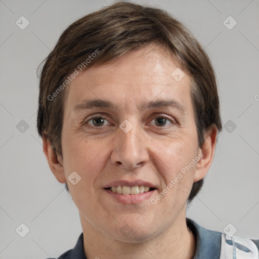 Joyful white adult male with short  brown hair and grey eyes