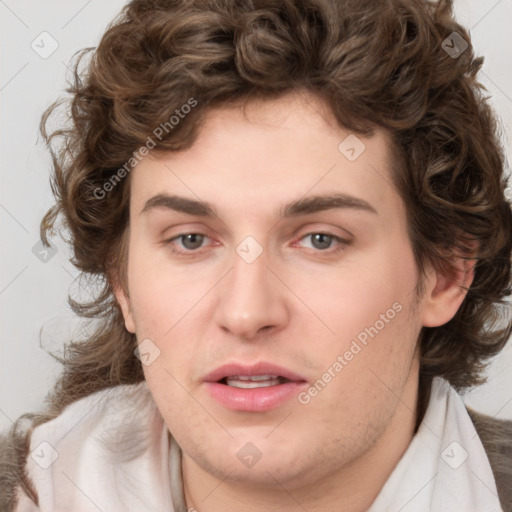 Joyful white young-adult male with medium  brown hair and brown eyes