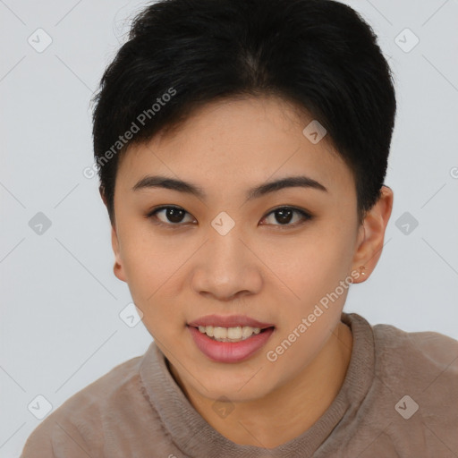 Joyful asian young-adult female with short  brown hair and brown eyes