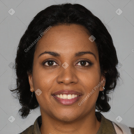 Joyful black young-adult female with medium  black hair and brown eyes