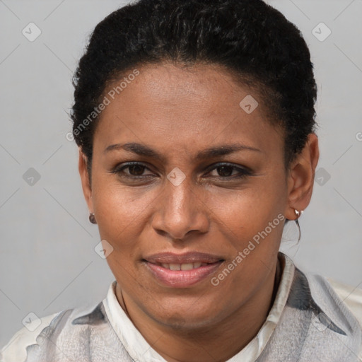 Joyful latino young-adult female with short  brown hair and brown eyes
