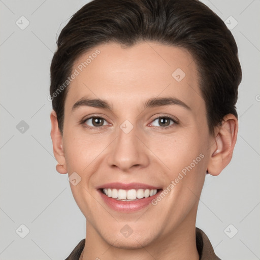 Joyful white young-adult female with short  brown hair and brown eyes