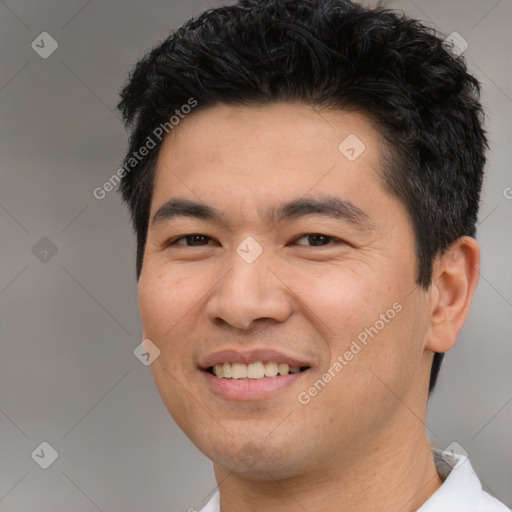 Joyful white young-adult male with short  black hair and brown eyes