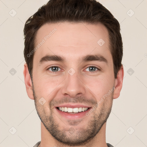 Joyful white young-adult male with short  brown hair and brown eyes