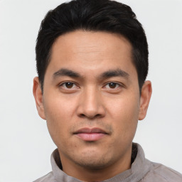 Neutral white young-adult male with short  black hair and brown eyes