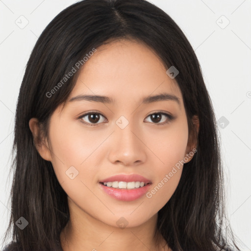 Joyful asian young-adult female with long  brown hair and brown eyes