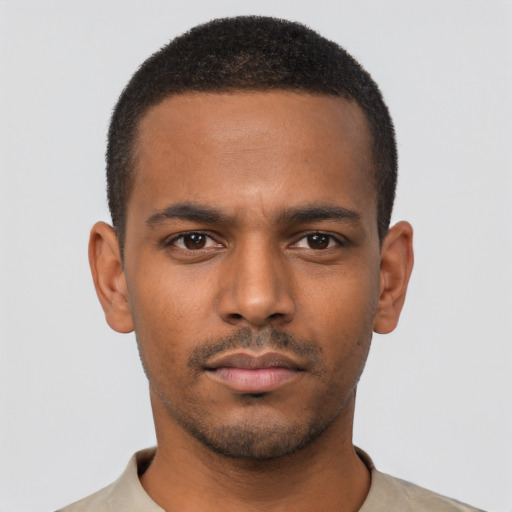 Neutral black young-adult male with short  black hair and brown eyes