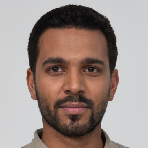 Neutral black young-adult male with short  black hair and brown eyes