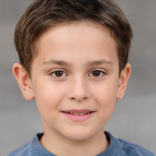 Joyful white child male with short  brown hair and brown eyes