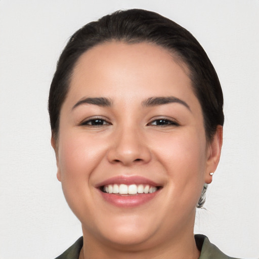 Joyful white young-adult female with short  black hair and brown eyes