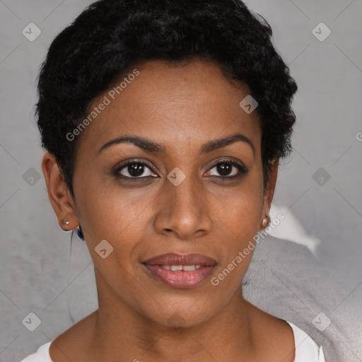 Joyful black young-adult female with short  black hair and brown eyes