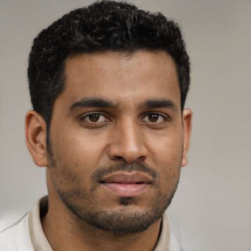 Neutral black young-adult male with short  black hair and brown eyes