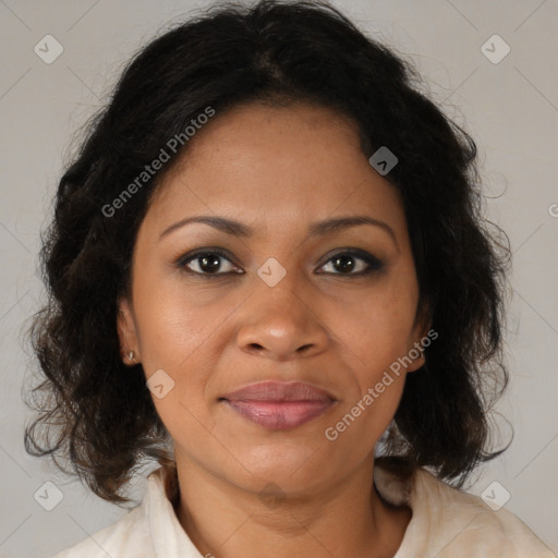 Joyful black adult female with medium  brown hair and brown eyes