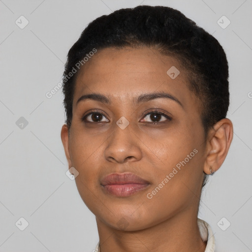 Joyful black young-adult female with short  brown hair and brown eyes