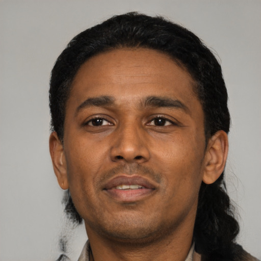 Neutral latino adult male with short  black hair and brown eyes