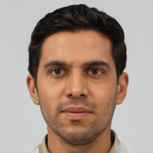 Neutral white young-adult male with short  black hair and brown eyes