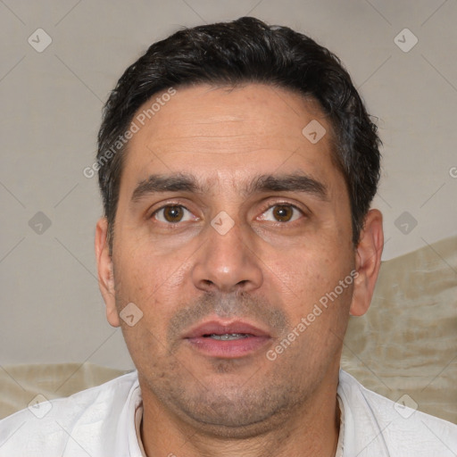 Neutral white adult male with short  black hair and brown eyes