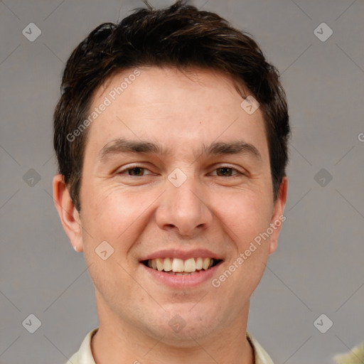 Joyful white adult male with short  brown hair and brown eyes