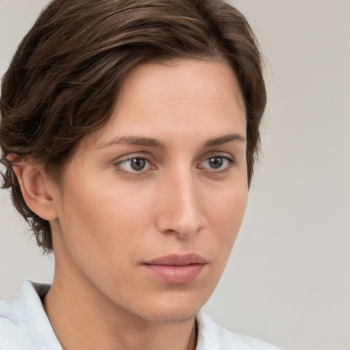 Neutral white young-adult female with medium  brown hair and grey eyes