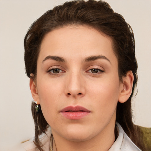 Neutral white young-adult female with short  brown hair and brown eyes