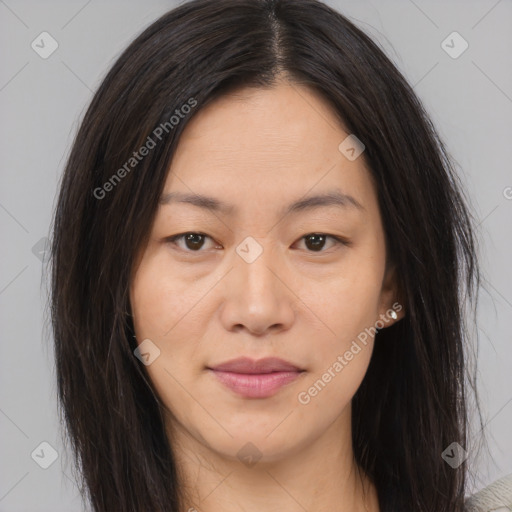 Joyful asian young-adult female with long  brown hair and brown eyes