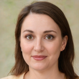 Joyful white young-adult female with medium  brown hair and green eyes