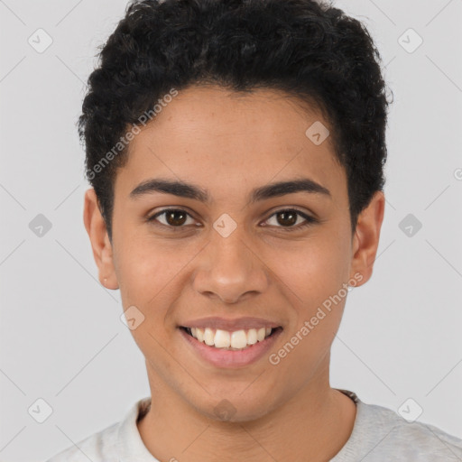 Joyful latino young-adult male with short  brown hair and brown eyes