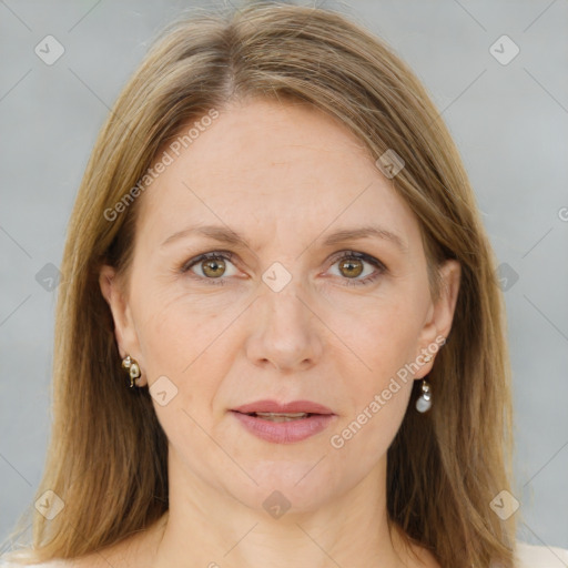 Joyful white adult female with medium  brown hair and brown eyes