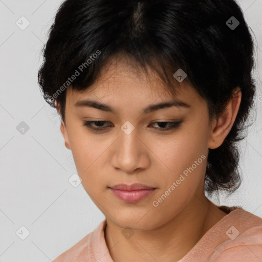 Joyful asian young-adult female with medium  brown hair and brown eyes