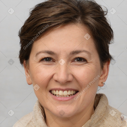 Joyful white adult female with short  brown hair and brown eyes