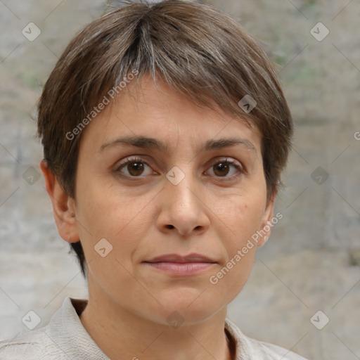 Joyful white adult female with short  brown hair and brown eyes